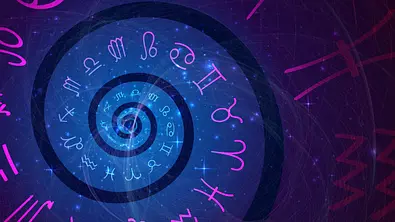 Spirale mit Sternzeichen-Symbolen in blau und pink - Foto: lidiia / AdobeStock