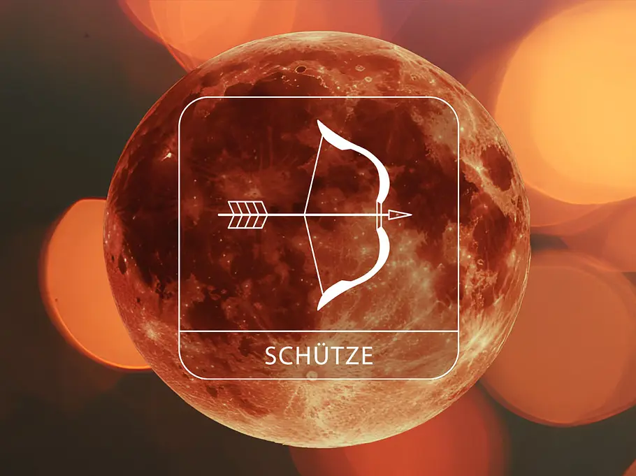 Sternzeichen Schütze vor einem Blutmond umgeben von leuchtenden Kreisen