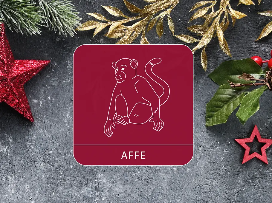 Das Sternzeichen Affe umgeben von weihnachtlicher Dekoration