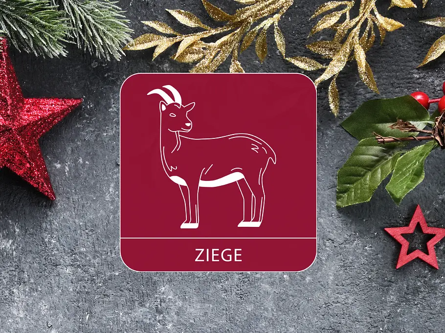 Das Sternzeichen Ziege umgeben von weihnachtlicher Dekoration