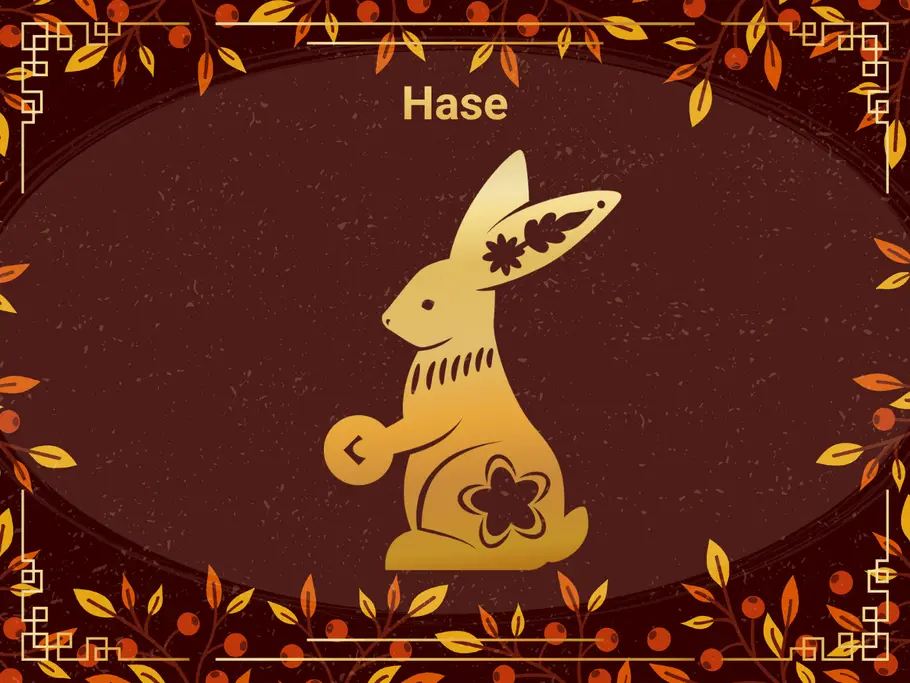 Das Sternzeichen Hase, umgeben von einem dunkelbraunen Hintergrund und Herbstblättern.