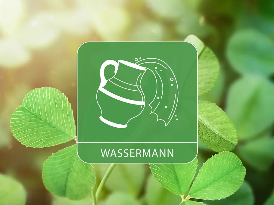 Das Sternzeichen Wassermann vor leuchtenden Kleeblättern