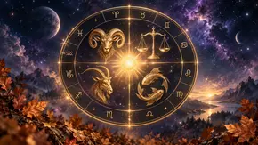 Ein goldener Tierkreis mit Widder, Ziege, Waage und Fischen schwebt vor einem Sternenhimmel über einer Berglandschaft mit See. - Foto: Astrowoche.de, KI generiert Ein goldener Tierkreis mit Widder, Ziege, Waage und Fischen schwebt vor einem Sternenhimmel über einer Berglandschaft mit See. - Foto: Astrowoche.de, KI generiert