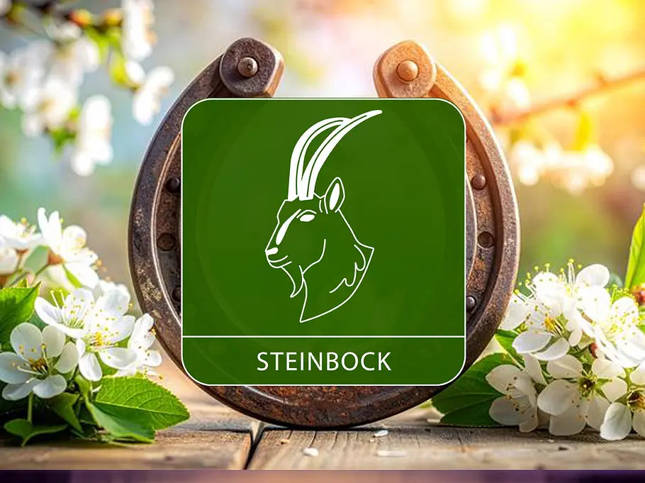 Das Sternzeichen Steinbock vor einem Hufeisen umgeben von Blumen