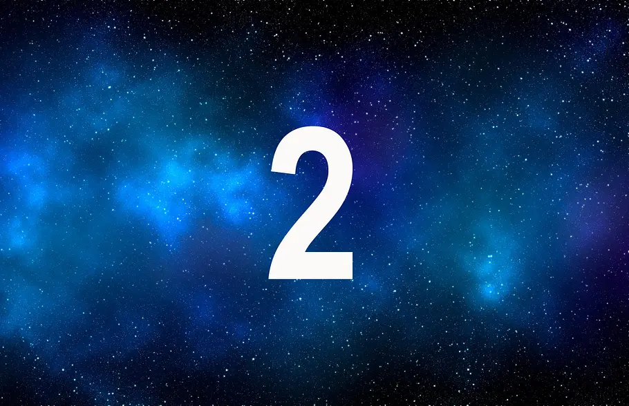 Die Namenszahl 2 vor einer blauen Galaxie