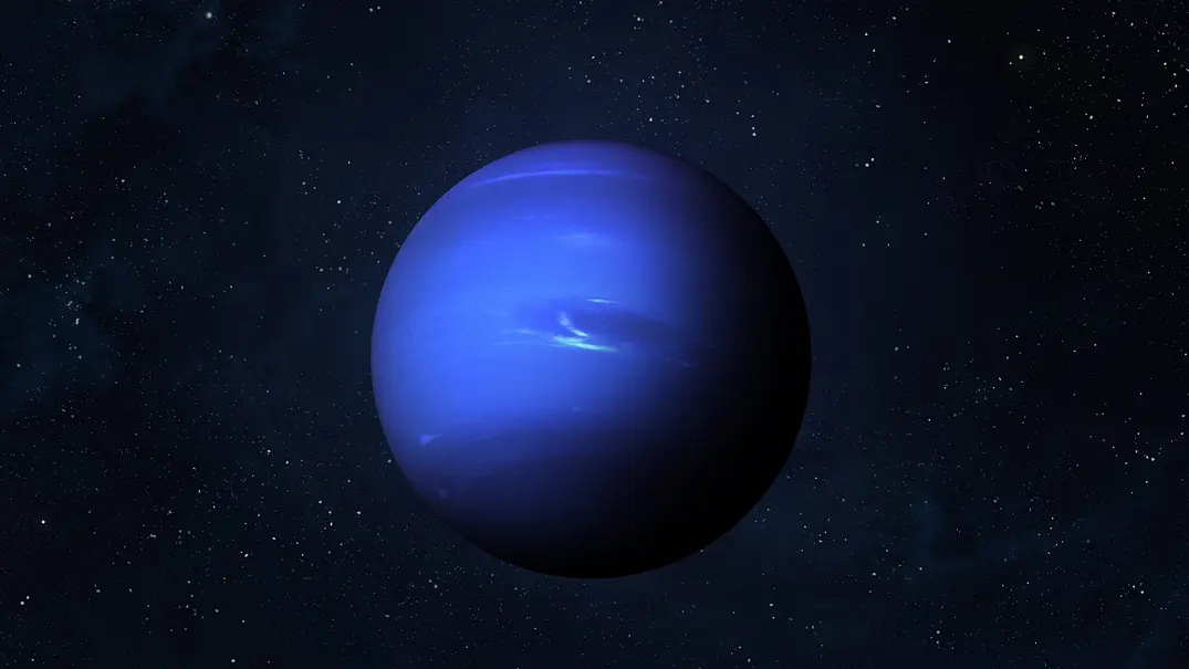 Sicht auf den blauen Planeten Neptun, umringt von Sternen. - Foto:  revers_jr/AdobeStock