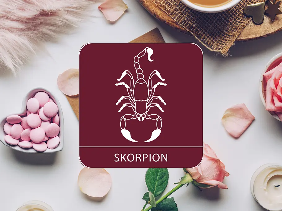 Sternzeichen Symbol vor einem Hintergrund mit einer Rose, Kerzen und Süßigkeiten