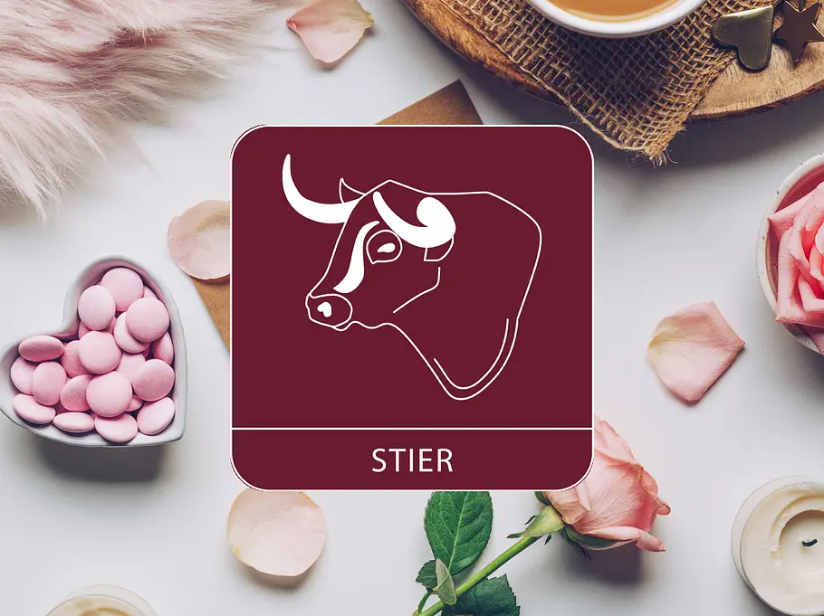 Sternzeichen Symbol Stier vor einem Hintergrund mit einer Rose, Kerzen und Süßigkeiten